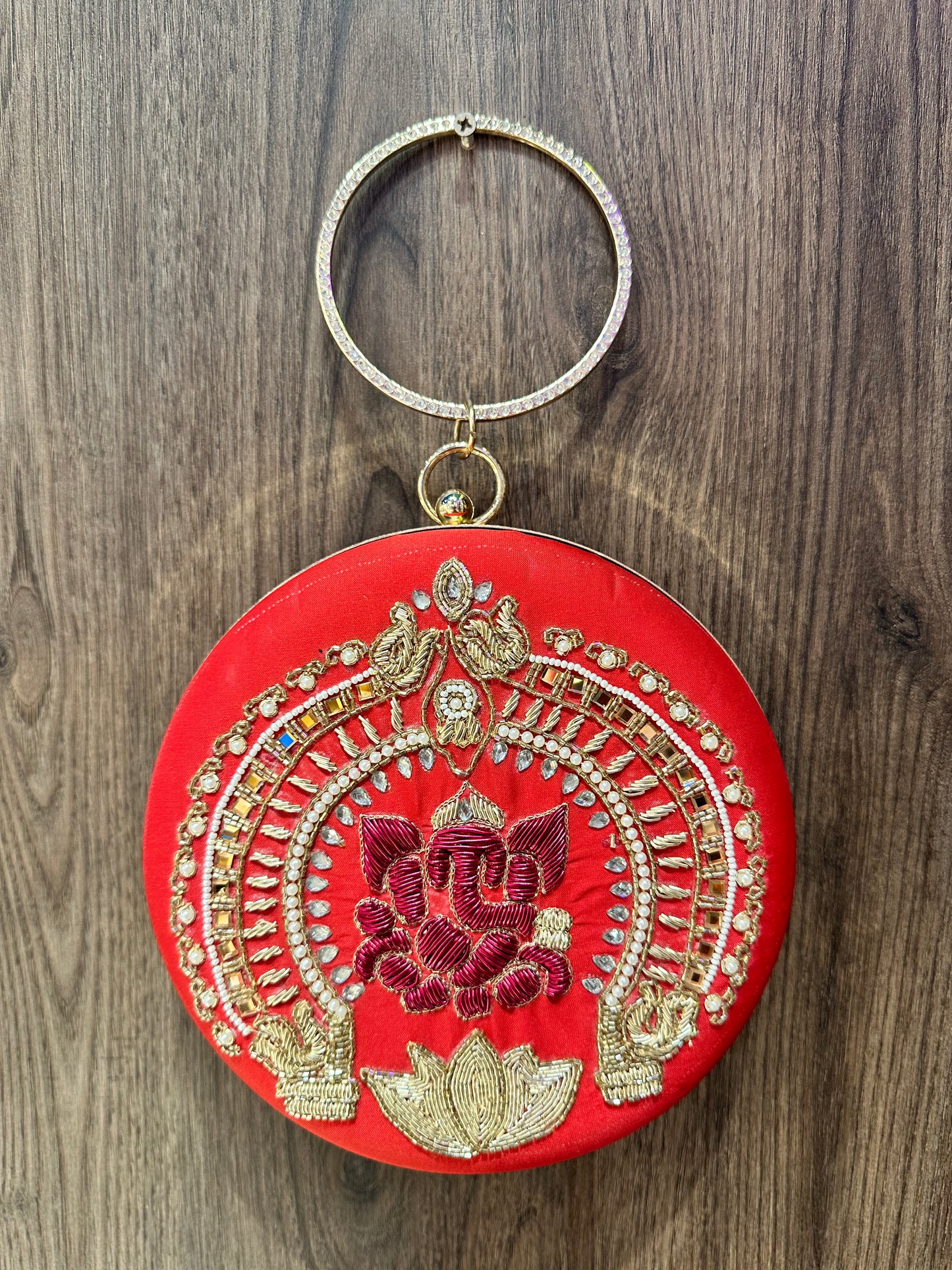 Red Ganesha Embroidered Diamond Studded Wristlet with Gold Sling Chain