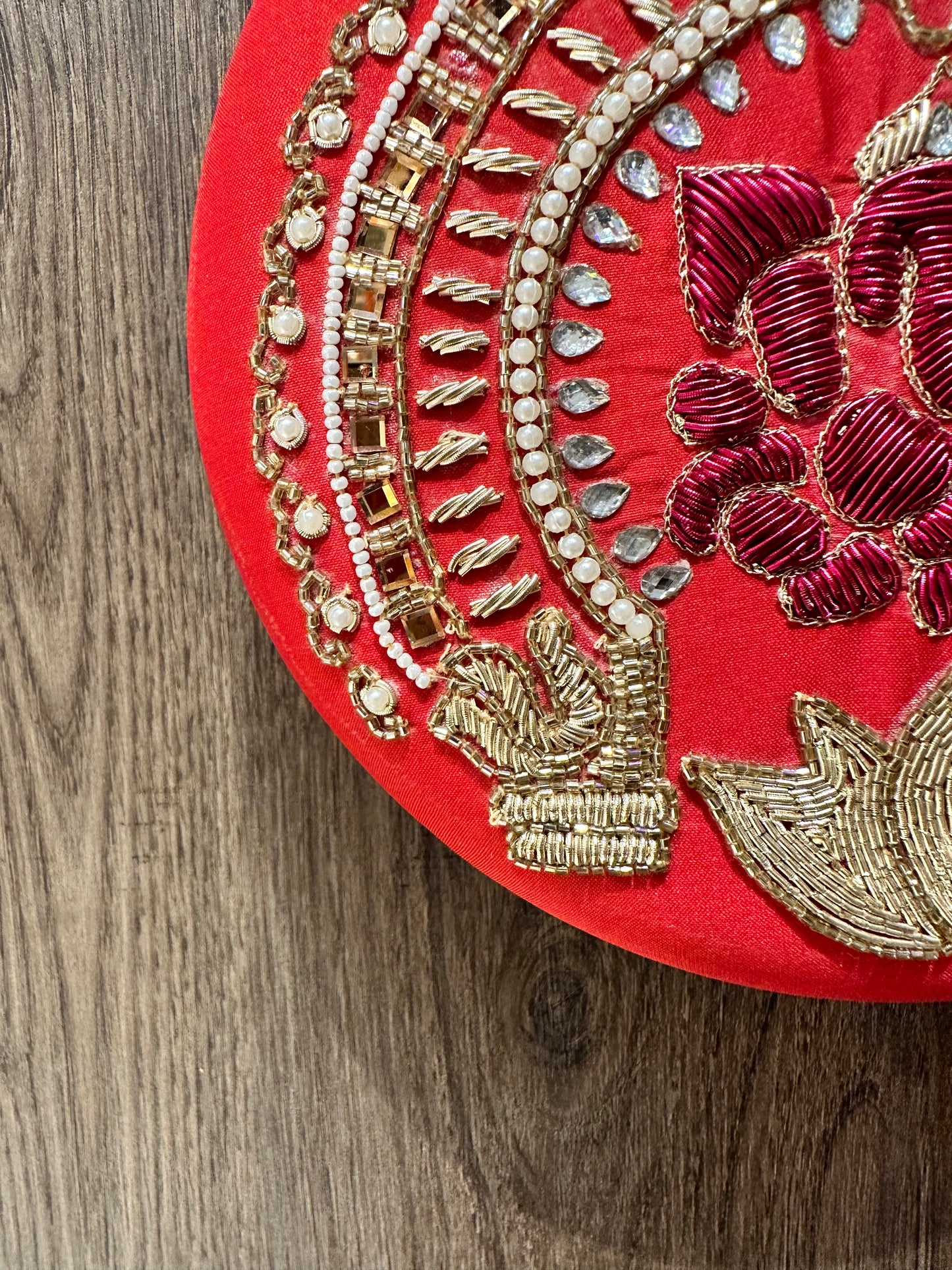 Red Ganesha Embroidered Diamond Studded Wristlet with Gold Sling Chain